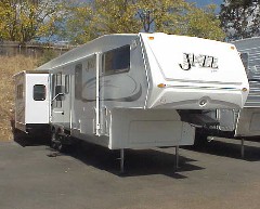 THOR JAZZ Right Front Model 3300TRE Triple Slide Fifth Wheel. CA RV Sales